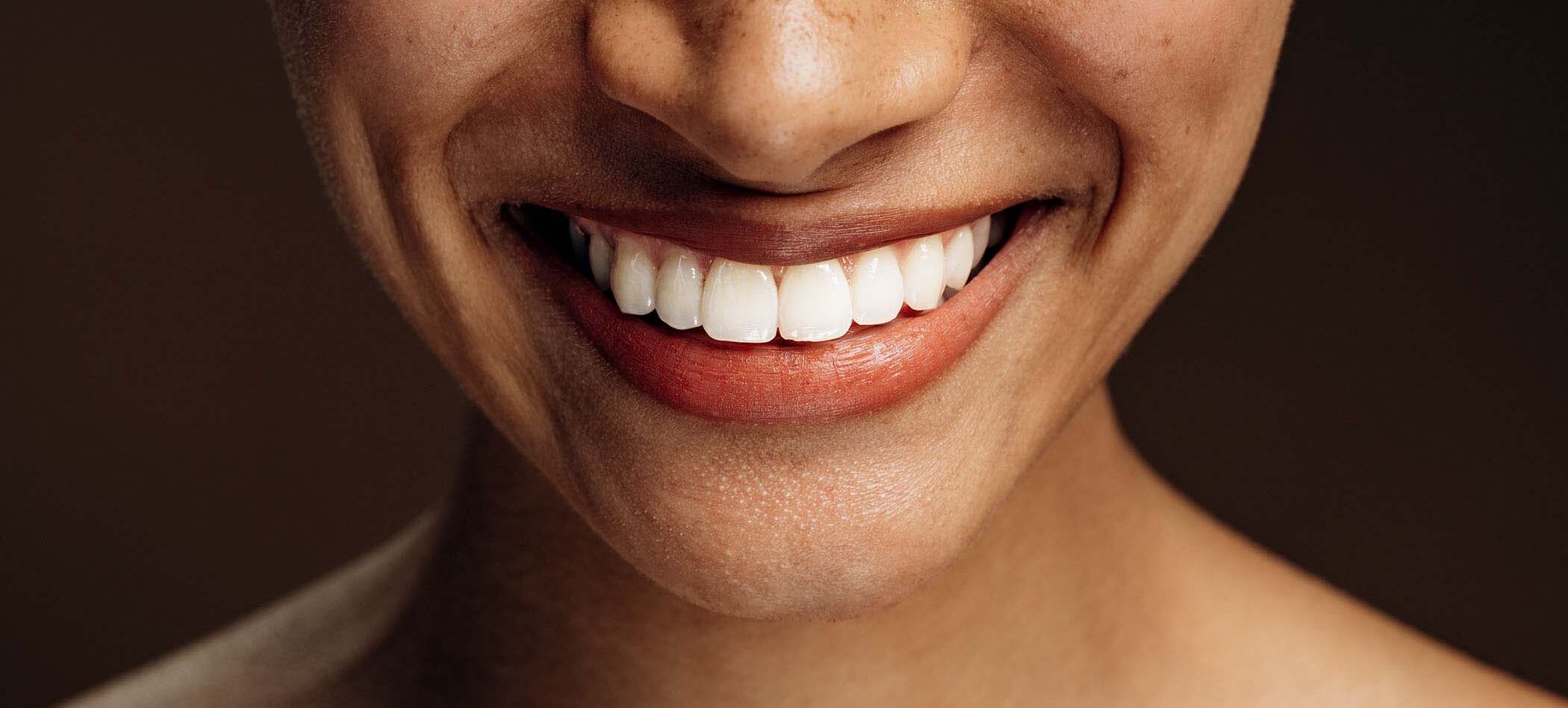 cropped-view-of-the-multiracial-woman-smiling-toot1-MHZJPRH