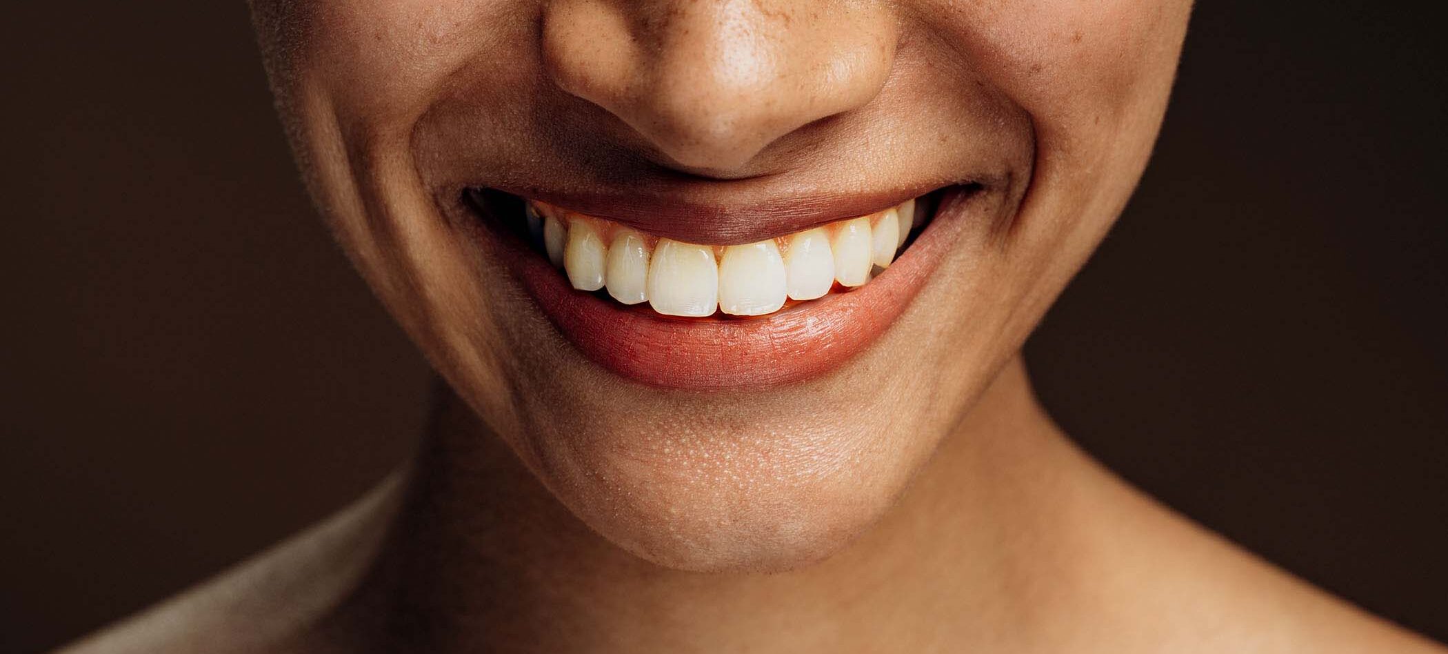 cropped-view-of-the-multiracial-woman-smiling-toot2-MHZJPRH